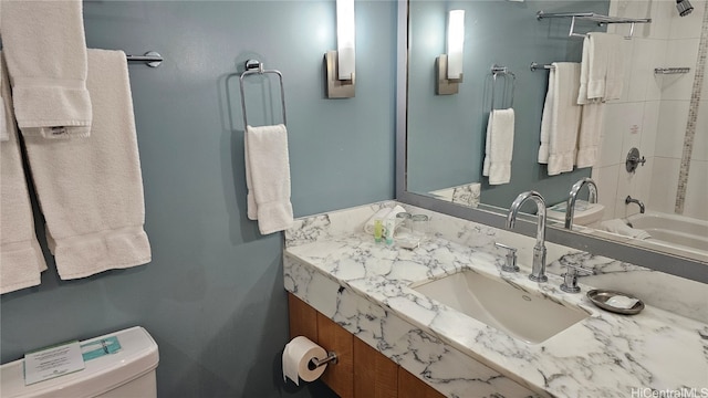 full bathroom with vanity, toilet, and shower / bathtub combination