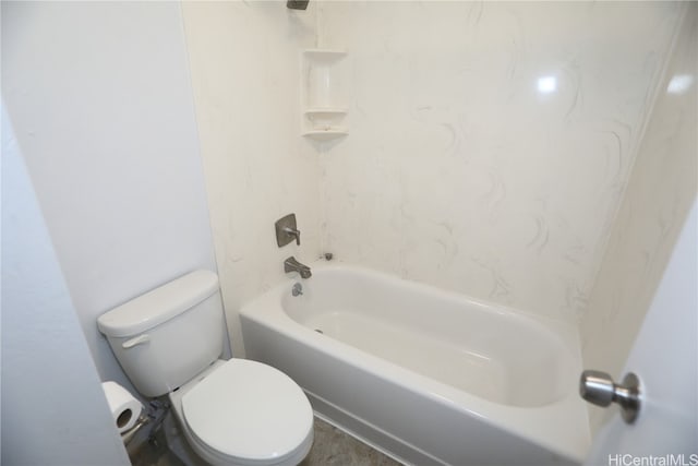 bathroom with tub / shower combination and toilet