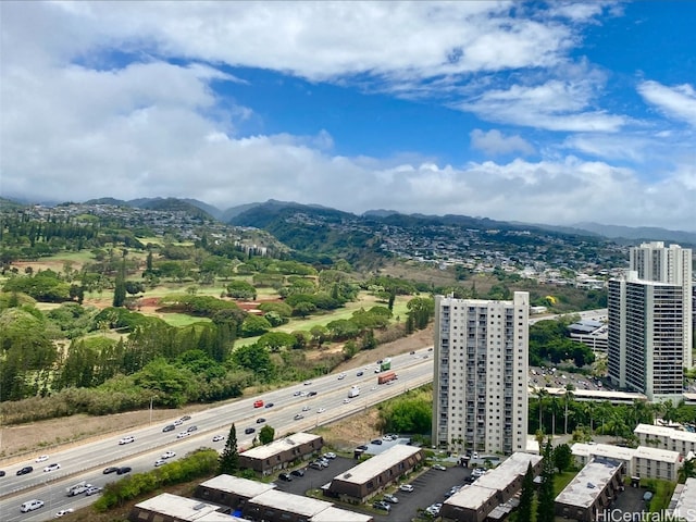 birds eye view of property with a mountain view