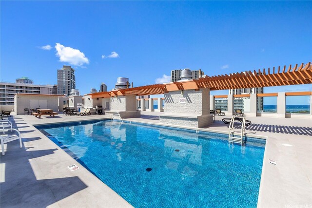 475 Atkinson Dr Unit 709, Honolulu, HI 96814 - community pool with a pergola and a patio