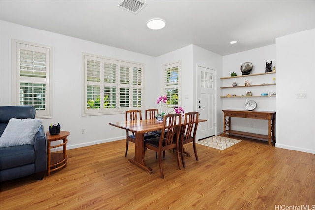 dining room featuring light hardwood / wood-style floors