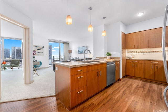 555 S St Unit 1904, Honolulu, HI 96813 - kitchen featuring dishwasher, a peninsula, light countertops, wood finished floors, and brown cabinets