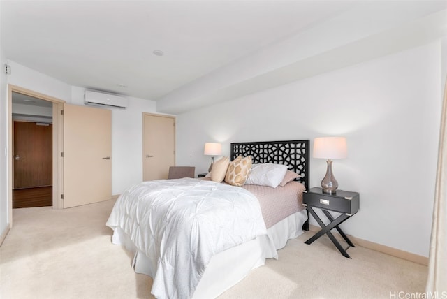 bedroom featuring light colored carpet and an AC wall unit