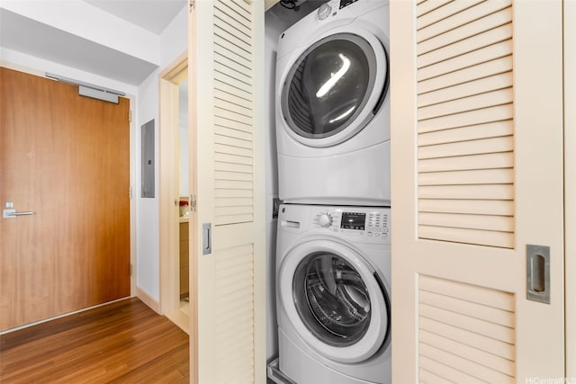 555 S St Unit 1904, Honolulu, HI 96813 - laundry room with estacked washer and dryer, electric panel, and wood finished floors
