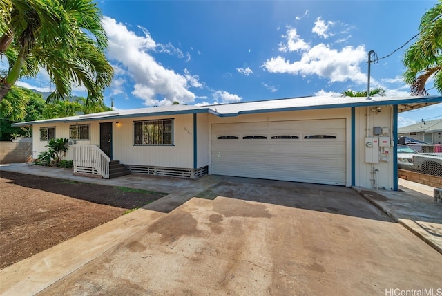 single story home with a garage