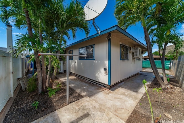 view of home's exterior with a patio area