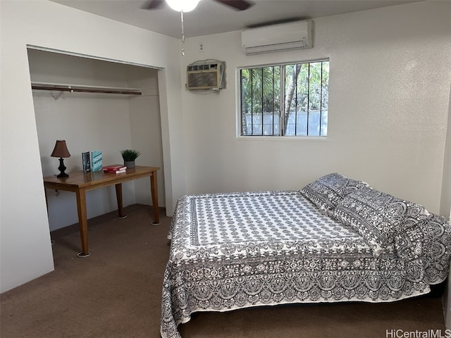 bedroom with a closet, ceiling fan, carpet floors, and a wall unit AC