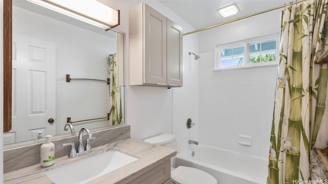 full bathroom with vanity, toilet, and shower / bath combo