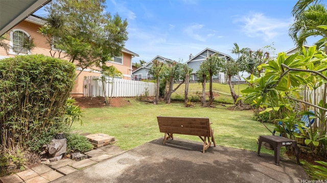 view of yard with a patio and fence