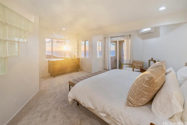 bedroom with light carpet and a wall mounted AC