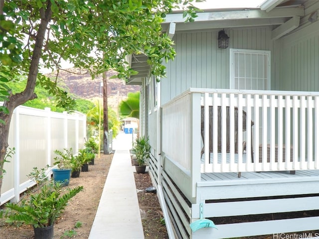 view of side of home featuring a deck