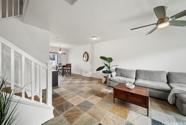 living room with ceiling fan