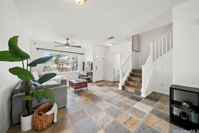 living room featuring ceiling fan