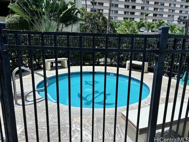 view of pool with a patio area