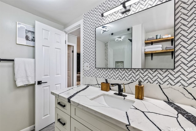 bathroom with backsplash and vanity