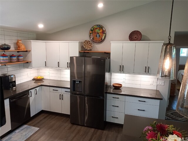 kitchen with lofted ceiling, white cabinets, and stainless steel fridge with ice dispenser