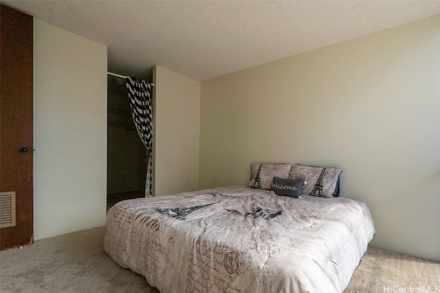 bedroom featuring carpet and visible vents