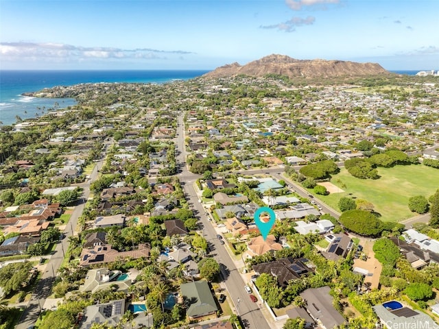 aerial view featuring a water and mountain view