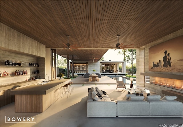 view of patio with an outdoor hangout area, a wet bar, and ceiling fan