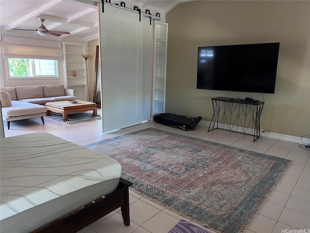 tiled bedroom featuring a barn door, baseboards, beamed ceiling, and coffered ceiling
