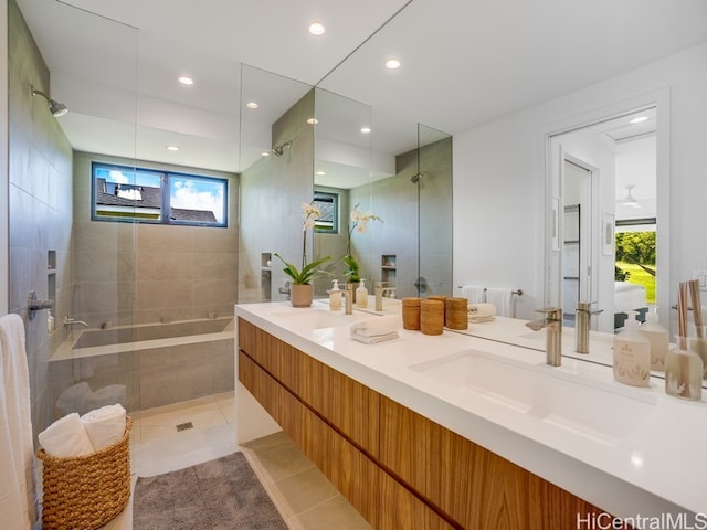 bathroom with vanity, shower with separate bathtub, tile patterned floors, and plenty of natural light