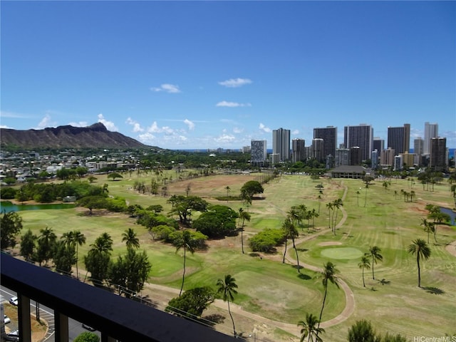 2916 Date St Unit 18B, Honolulu, HI 96816 - view of mountain background featuring a skyline view, a golf course, and a nearby body of water