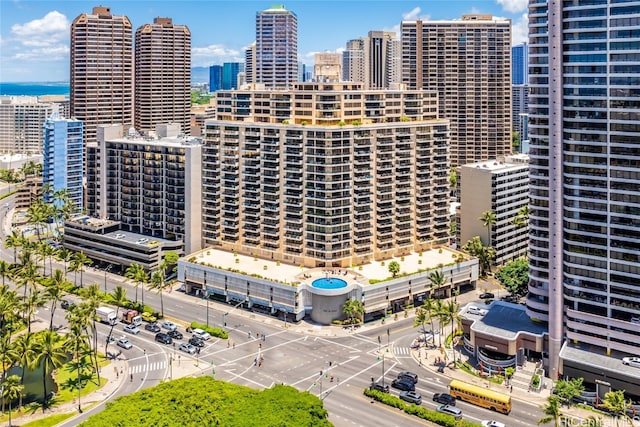 property's view of city featuring a water view