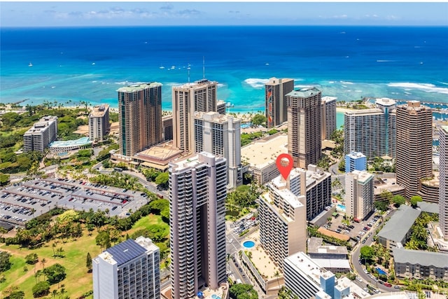 birds eye view of property with a water view