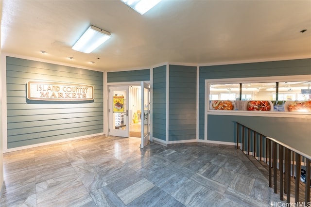 interior space featuring wood walls