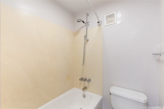 bathroom featuring toilet and shower / bath combination