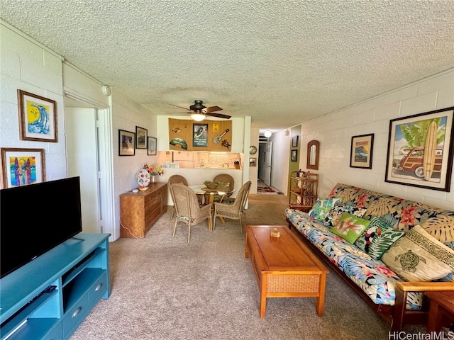 living room with light carpet, a textured ceiling, and ceiling fan