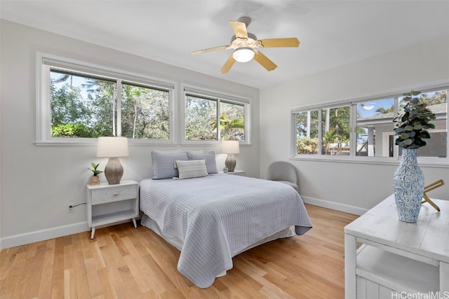 bedroom featuring light hardwood / wood-style flooring and ceiling fan