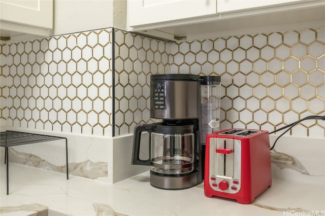 interior space featuring white cabinets