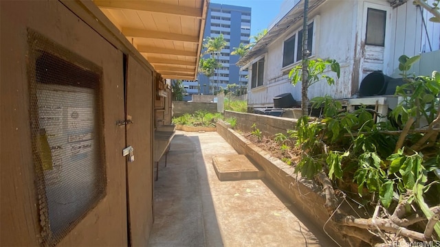 view of property exterior with a patio