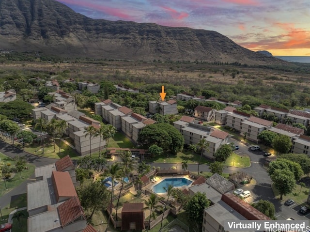 aerial view at dusk with a mountain view