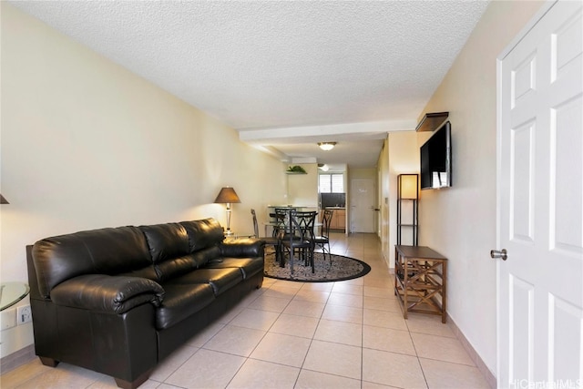 tiled living room with a textured ceiling