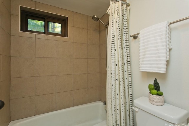 full bath featuring shower / tub combo and toilet