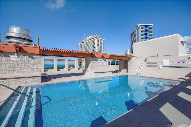 view of pool featuring a patio area