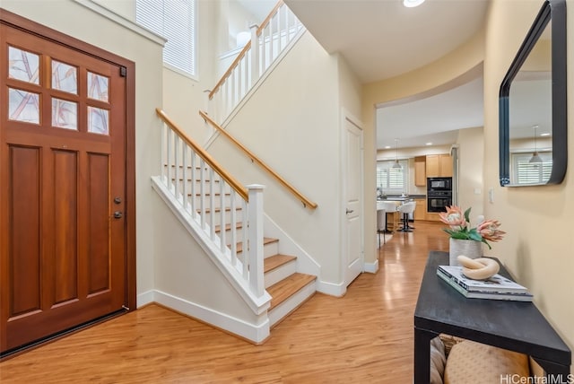 foyer featuring light wood-type flooring