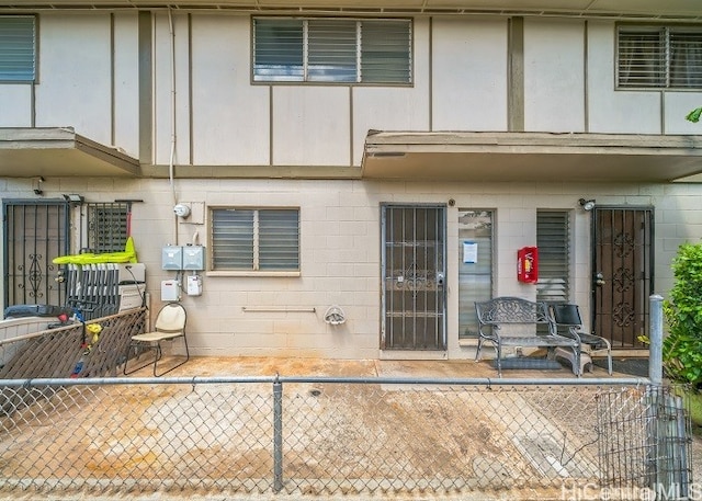 back of property with a patio area