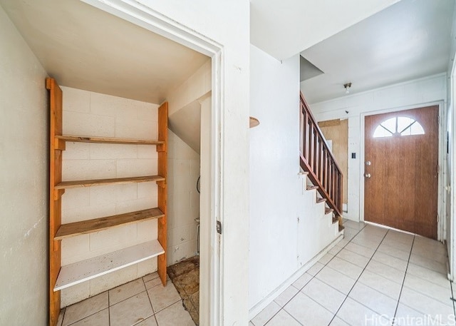 interior space with light tile patterned floors