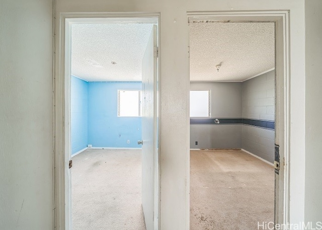 interior space featuring a textured ceiling