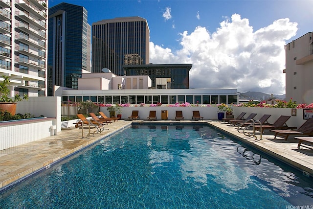 700 Richards St Unit 907, Honolulu, HI 96813 - pool featuring a patio area and fence