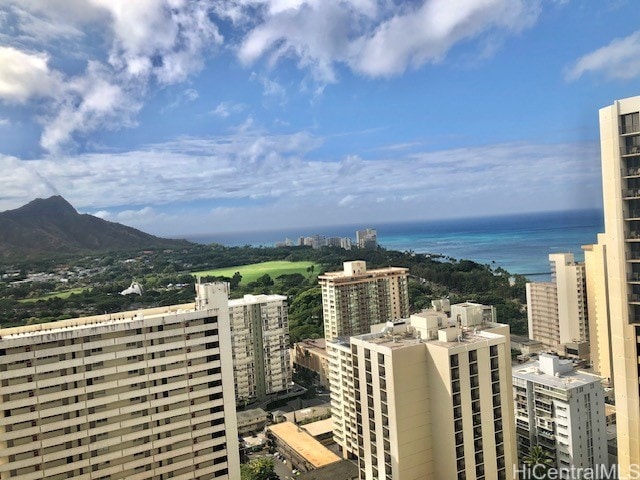 city view featuring a water and mountain view