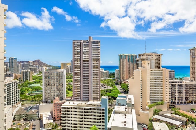 property's view of city featuring a water view