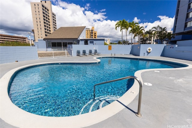 view of pool featuring a patio