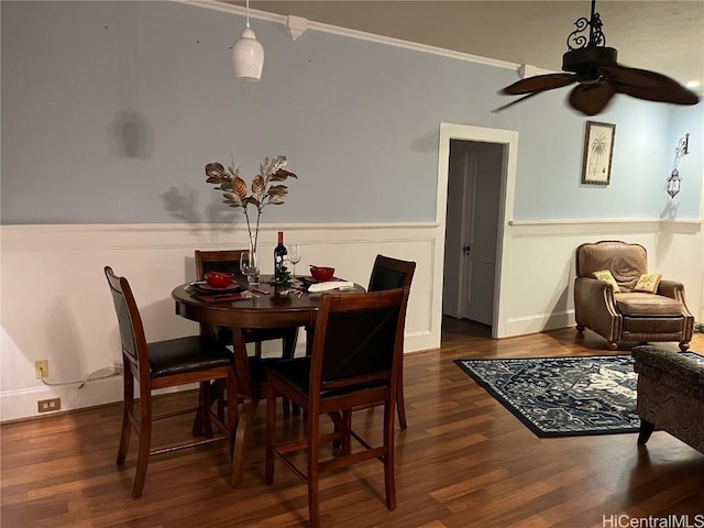 dining room featuring ceiling fan and dark hardwood / wood-style flooring