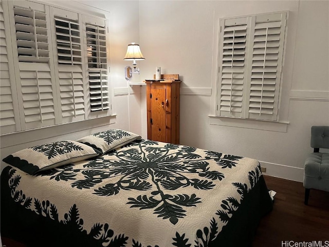 bedroom featuring dark hardwood / wood-style floors