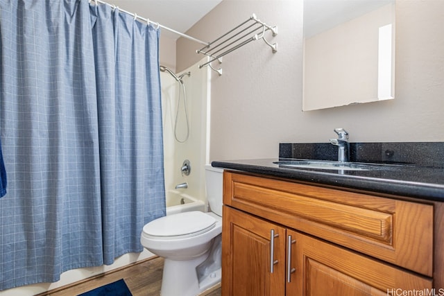 full bathroom with vanity, toilet, shower / bathtub combination with curtain, and wood-type flooring