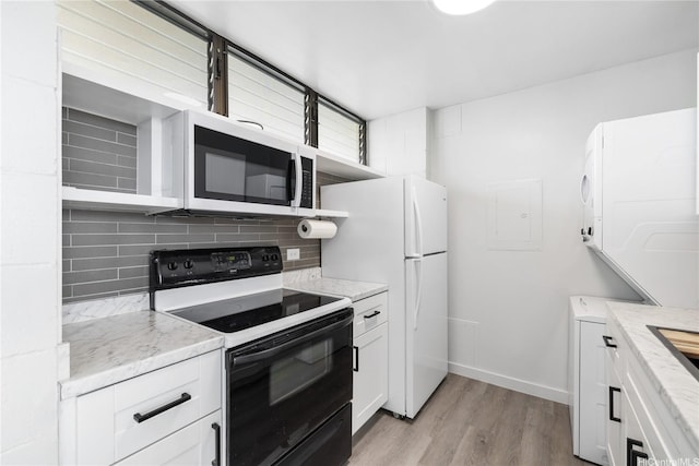 1040 Kinau St Unit 803, Honolulu, HI 96814 - kitchen with white appliances, white cabinets, light wood finished floors, decorative backsplash, and open shelves